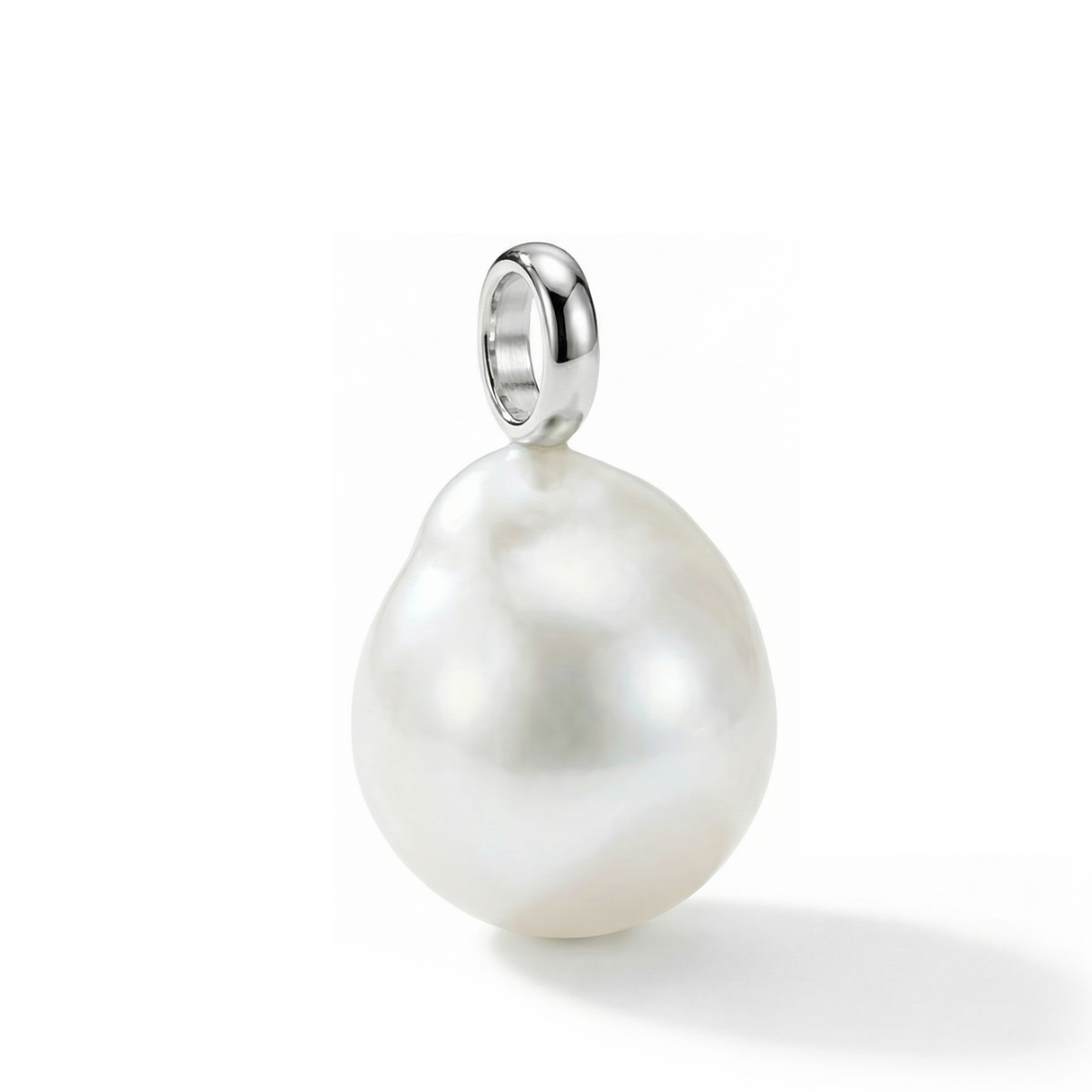 Pearl pendant with silver setting on a white background