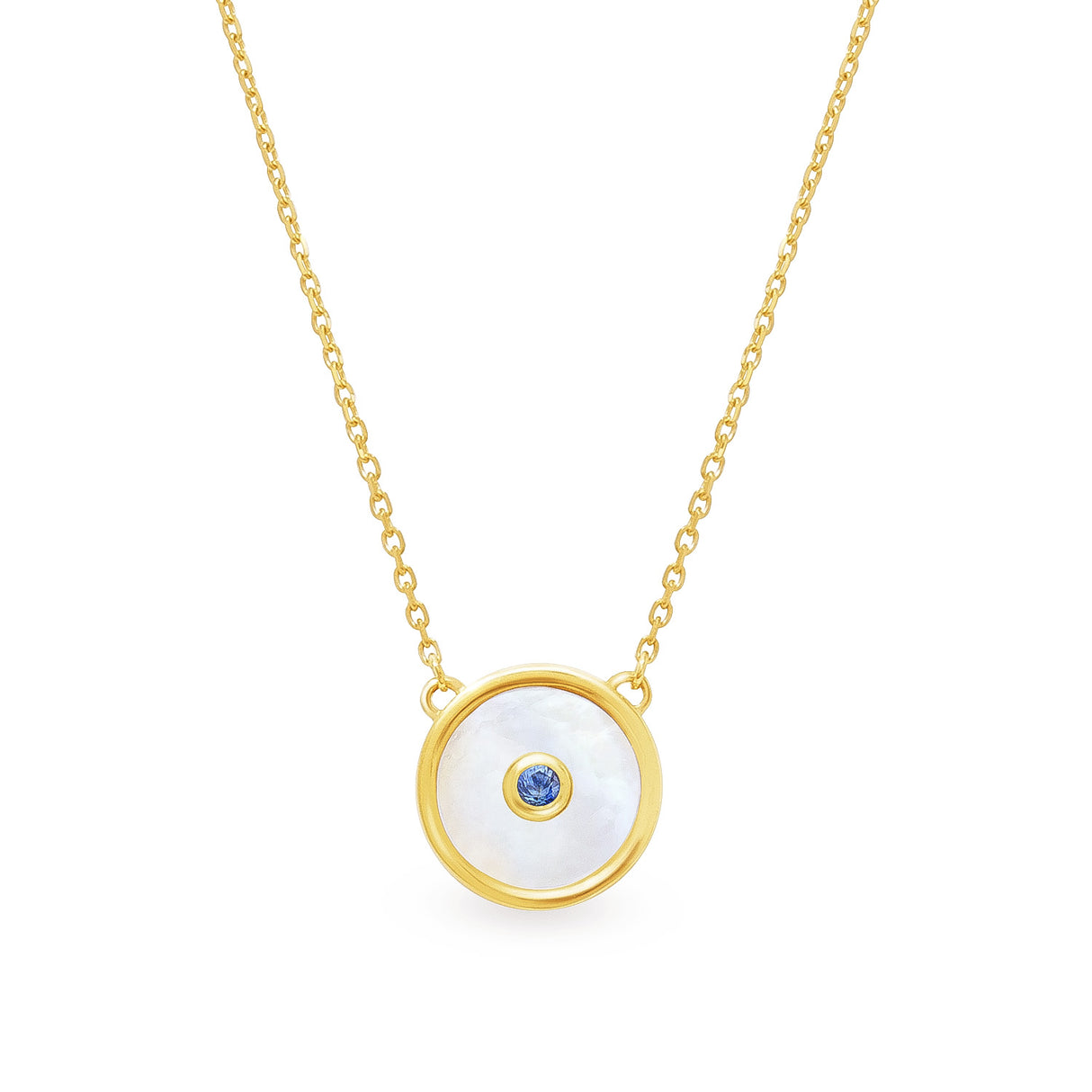 A necklace with a yellow gold finish, featuring a central mother of pearl shell with a small blue sapphire, on a chain.