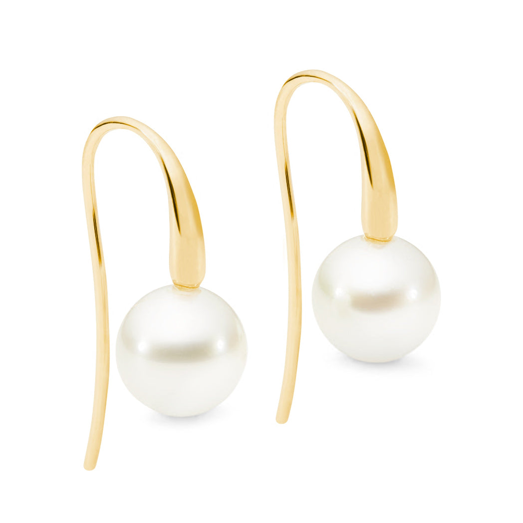 These 18K Yellow Gold shepherd hook earrings showcase 10mm NL1 South Sea pearls. The design is also available in White and Rose Gold. The total height of the earrings is 22mm, offering a simple yet modern look.