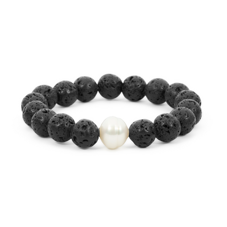 The Agung Volcanic Bracelet combines volcanic rock with 18K white gold, symbolizing the strength of Mount Agung. It features one 11mm white South Sea pearl (NL3 shape, C1 grade), available in sizes 16cm, 18cm, and 20cm.