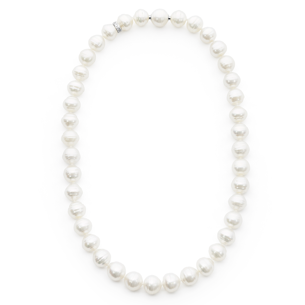 Circle South Sea pearl strand with 40 white pearls (10.8 x 10mm), hand-selected for size, shape, lustre, and colour. This 42cm strand is finished with a 925 silver Nittle clasp and rondel, showcasing the natural beauty of sustainably sourced pearls from Atlas Pearls.