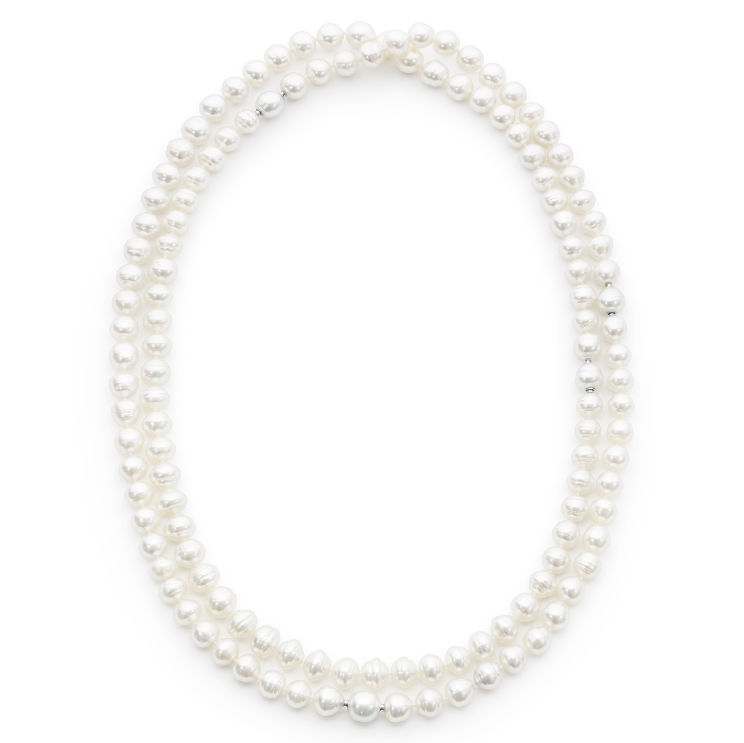 Versatile Circle South Sea pearl strand featuring 130 white pearls (11.3 x 9.5mm), sustainably sourced from Atlas Pearls' Indonesian farms. This 134cm strand is finished with a 925 silver Nittle and offers the ability to create multiple elegant looks.