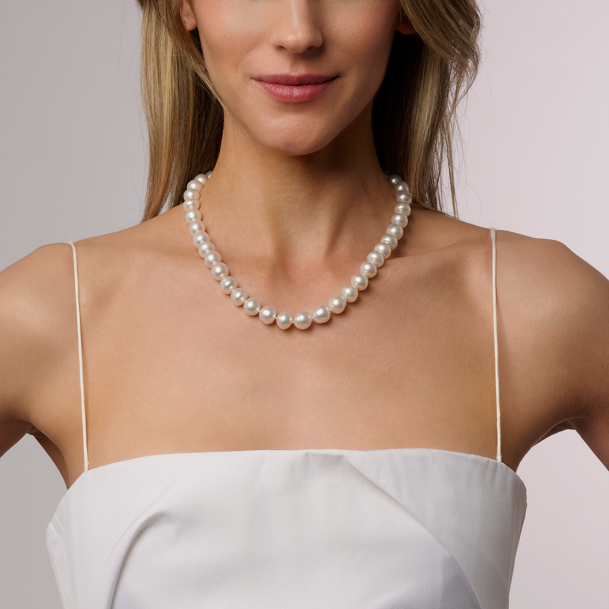 "Circle South Sea pearl strand featuring 46 white pearls (11.2 x 10mm). Finished with a 925 silver Nittle and rondel, this 47cm strand showcases the elegance and craftsmanship of sustainably sourced pearls from Atlas Pearls’ Indonesian farms.