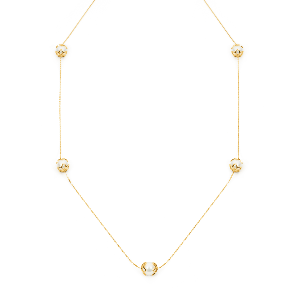 This station necklace features five 9mm semi-round South Sea pearls set in 18K yellow gold frangipani cups. The 90cm chain is adjustable to 80cm, offering flexibility for various looks. Perfect for adding elegance and sophistication to any ensemble.