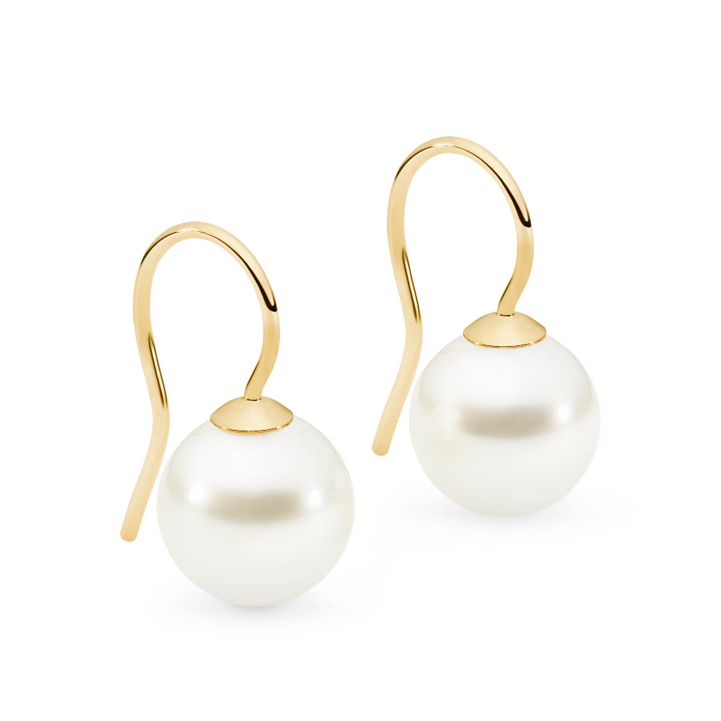 These 18K Yellow Gold shepherd hook earrings feature a simple design with a 9mm South Sea pearl that sits close to the ear. Available in Yellow, White, and Rose Gold, the earrings have a fixed style and measure 19mm, including the pearl and hook.