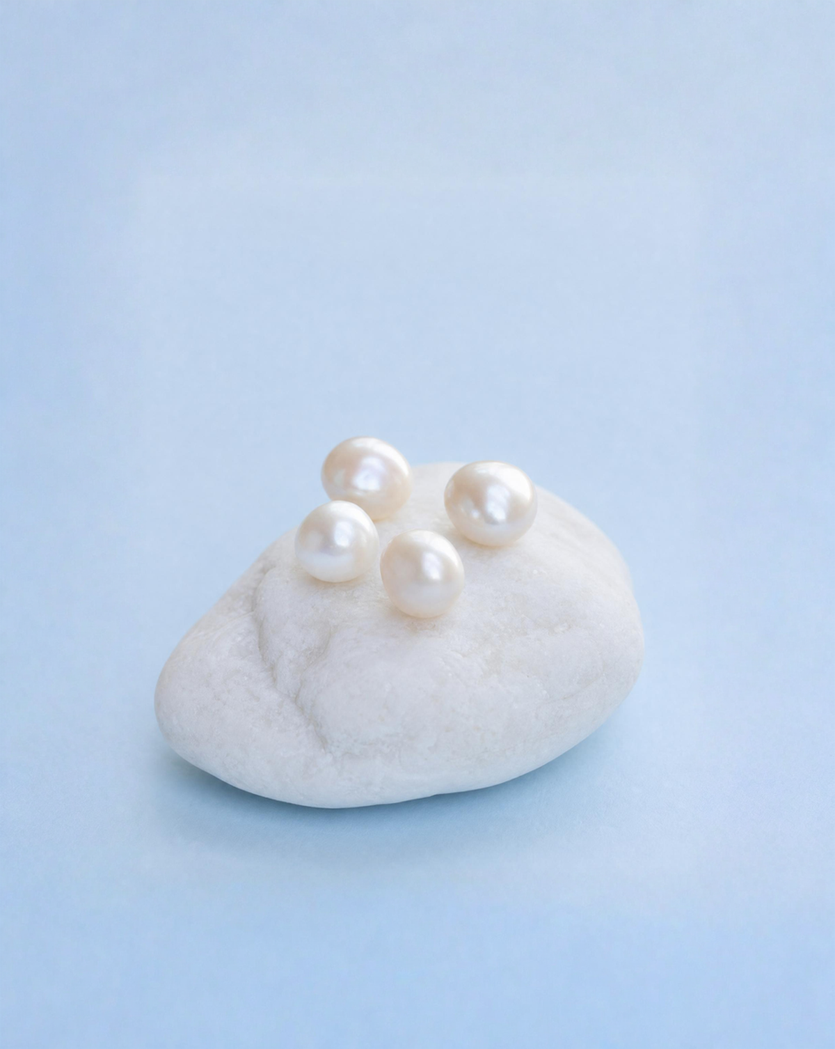 White cultured pearls showcasing their natural lustre, elegance, and timeless beauty.