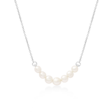 Pearl necklace on a white background