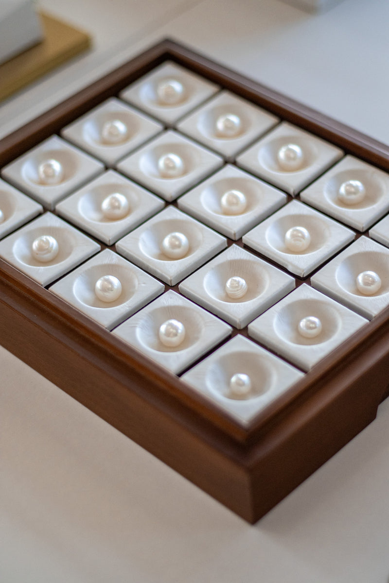 Tray of loose pearls on display 