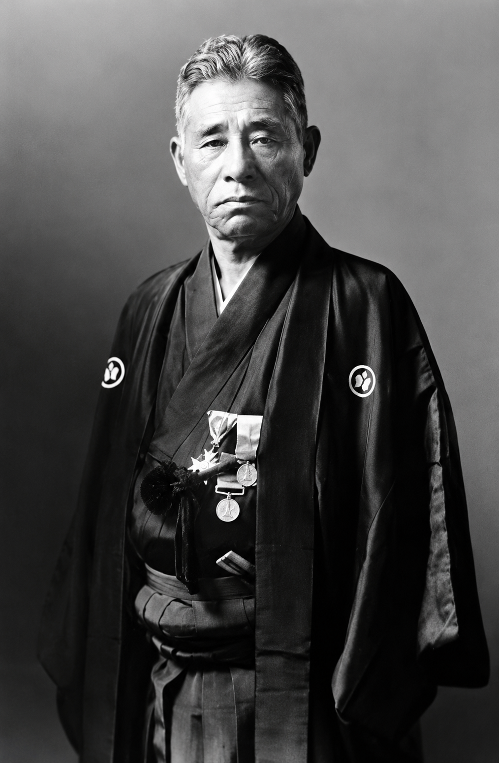 Historical portrait of Kokichi Mikimoto, pioneer of cultured pearls and founder of the modern pearl cultivation industry.