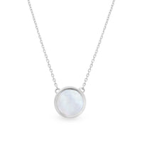 A silver necklace with a circular mother of pearl pendant, displayed against a white background.
