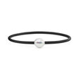 This black neoprene bracelet features a 10mm Circle South Sea pearl, known for its distinct concentric lines. The pearl, selected for its heavily circled appearance, adds a unique touch to the design. The bracelet is available in lengths of 17, 19, and 21cm, offering a customizable fit.