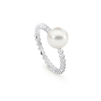 A sterling silver ring with a rope design featuring a round South Sea pearl.