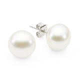 Flat Button (BF) pearls are a popular and accessible choice, often appearing round from the front but flatter in shape. These earrings are available in 18K white or yellow gold, as well as Sterling Silver, with sizes ranging from 9mm to 12mm. Due to their shape and availability, Flat Button studs are highly sought after, offering a balance of elegance and affordability.