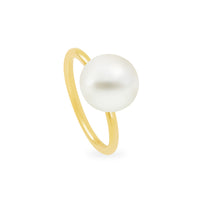 A 18K yellow gold ring with a single South Sea white pearl centered on the top.