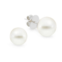 A pair of pearl stud earrings with high button shape, set in 18K white gold.