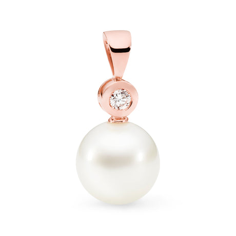 This classic pendant features an 11mm South Sea pearl in 18K rose gold, enhanced by a 0.06ct bezel-set diamond. The total height of the pendant, including the bail and pearl, is 22mm. Available in 18K white, yellow, and rose gold, with chains sold separately.