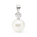 This classic 18K white gold pendant features a 11mm South Sea pearl in an NL1 shape, with a B-grade white pearl. It is accented by a bezel-set 0.06ct diamond. The pendant's total height, including the bail and pearl, is 22mm. This design is available in 18K white, yellow, and rose gold, with chains sold separately.