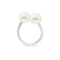 An 18K white gold ring with two white South Sea pearls set parallel to each other on the top.