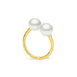 This simple and classic 18K Yellow Gold ring features two 8mm South Sea pearls, offering timeless elegance. The design is also available in 18K White and Rose Gold, providing versatility for different tastes. The ring is adjustable, ensuring a comfortable fit.